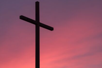 brown wooden cross during golden hour